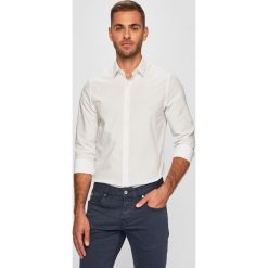 Calvin Klein Jeans - Koszula. Niebieskie koszule męskie Calvin Klein Jeans, s, bez wzorów, z elastanu, klasyczne, z klasycznym kołnierzykiem, z długim rękawem. Za 299,90 zł.