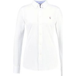 Polo Ralph Lauren HEIDI Koszula white. Białe koszulki damskie polo Polo Ralph Lauren, xl, bez wzorów, z bawełny, polo, bez rękawów. Za 519,00 zł.