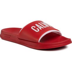 Klapki CALVIN KLEIN SWIMWEAR - Slide KM0KM00495 XBG. Czerwone klapki damskie Calvin Klein Swimwear, bez wzorów, z tworzywa sztucznego, bez obcasa. Za 179,00 zł.