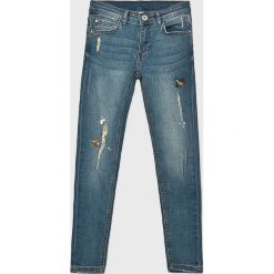 Blukids - Jeansy dziecięce 140-170 cm. Niebieskie jeansy dziewczęce Blukids, bez wzorów, z elastanu. W wyprzedaży za 49,90 zł.