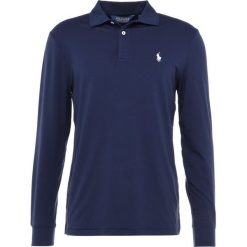 Polo Ralph Lauren Golf LONG SLEEVE KNIT Koszulka sportowa french navy. Niebieskie koszulki męskie marki Polo Ralph Lauren Golf, m, bez wzorów, z elastanu, sportowe, z golfem, z długim rękawem, długie. Za 479,00 zł.