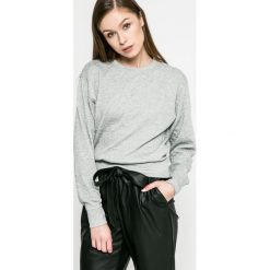 Jacqueline de Yong - Bluza Wilder. Czarne bluzy damskie marki Jacqueline de Yong, s, bez wzorów, z elastanu, bez rękawów, bez kaptura. W wyprzedaży za 34,90 zł.