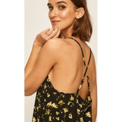 Calvin Klein Jeans - Bluzka. Czarne bluzki damskie Calvin Klein Jeans, s, bez wzorów, z poliesteru, bez kołnierzyka, bez rękawów. W wyprzedaży za 249,90 zł.
