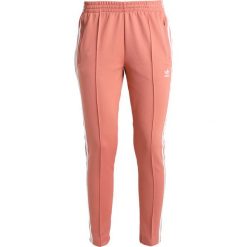 Spodnie dresowe damskie: adidas Originals ADICOLOR Spodnie treningowe ash pink