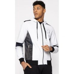 Bluza John Richmond Cali RMP20164FE. Białe bluzy męskie John Richmond, m, bez wzorów, z bawełny, bez kołnierzyka, bez rękawów, bez kaptura. W wyprzedaży za 679,00 zł.