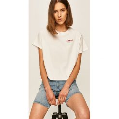 Levi's - T-shirt. Białe bluzki damskie Levi's®, s, z aplikacjami, z bawełny, casualowe, z okrągłym kołnierzem, z krótkim rękawem. W wyprzedaży za 59,90 zł.