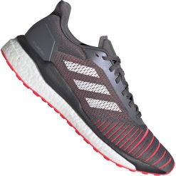 Buty adidas Solar Drive M D97450. Fioletowe buty sportowe męskie Adidas, na wiosnę, z tkaniny, bez zapięcia, do biegania. W wyprzedaży za 429,00 zł.
