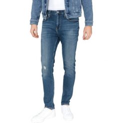 Calvin Klein 016 Dżinsy Niebieski. Niebieskie jeansy męskie Calvin Klein, bez wzorów. Za 497,95 zł.