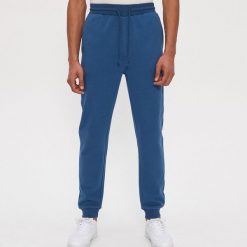 Joggery z organicznej bawełny - Granatowy. Niebieskie spodnie męskie House, s, bez wzorów, z bawełny. Za 89,99 zł.