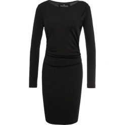 DESIGNERS REMIX MELODY DRESS Sukienka dzianinowa black. Białe sukienki dzianinowe marki DESIGNERS REMIX, polo. Za 609,00 zł.