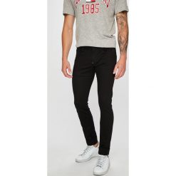 G-Star Raw - Jeansy Revend. Czarne jeansy męskie regular G-Star RAW, z bawełny. W wyprzedaży za 399,90 zł.