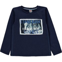 Koszulka w kolorze granatowym. Niebieskie t-shirty chłopięce Kanz, z nadrukiem, z bawełny, z długim rękawem. W wyprzedaży za 35,95 zł.