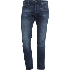 GStar Jeansy Slim Fit trender ultimate denim. Niebieskie jeansy męskie marki G-Star, z elastanu. Za 609,00 zł.