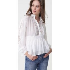 Biała Bluzka Helium. Białe bluzki damskie Born2be, s, bez wzorów, ze stójką, bez rękawów. Za 99,99 zł.