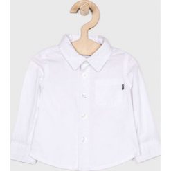 Blukids - Koszula dziecięca 68-98 cm. Białe koszule chłopięce marki Blukids, bez wzorów, z bawełny, klasyczne, z klasycznym kołnierzykiem, z długim rękawem, długie. W wyprzedaży za 37,90 zł.