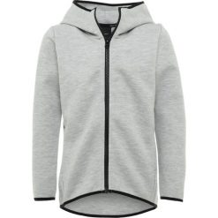 Peak Performance Bluza rozpinana grey/black. Szare bluzy dziewczęce marki Peak Performance, z bawełny. W wyprzedaży za 356,15 zł.