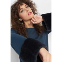 Koszulka ze sztucznym futrem. Niebieskie t-shirty damskie Orsay, xs, z dzianiny. Za 59,99 zł.