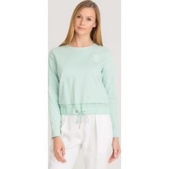 BLUZA ELISABETTA FRANCHI. Zielone bluzy damskie Elisabetta Franchi, z aplikacjami, z bawełny, bez rękawów, bez kaptura. Za 569,40 zł.