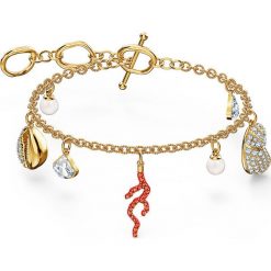 Swarovski - Bransoletka Shell Coral. Żółte bransoletki damskie Swarovski, z kryształem, metalowe. Za 499,90 zł.