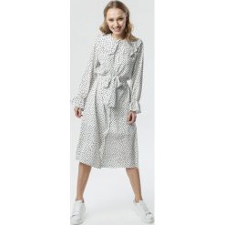 Biała Sukienka Sumayah. Białe sukienki damskie Born2be, s, bez wzorów, z tkaniny, z falbankami, z długim rękawem, długie, midi, trapezowe. Za 149,99 zł.