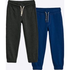 Blukids - Spodnie dziecięce 98-128 cm. Niebieskie spodnie chłopięce marki Blukids, z bawełny. W wyprzedaży za 39,90 zł.