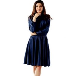 Sukienka w kolorze granatowym. Niebieskie sukienki damskie Far Far Fashion, Ryłko by Agnes&Paul, bez wzorów, ze stójką, bez rękawów. W wyprzedaży za 109,95 zł.