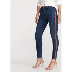 Jeansy slim z lampasami - Granatowy. Niebieskie jeansy damskie Reserved. Za 99,99 zł.