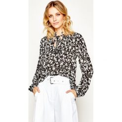 Bluzka Lauren Ralph Lauren 200786780. Czarne bluzki damskie Lauren Ralph Lauren, s, bez wzorów, z poliesteru, bez kołnierzyka, bez rękawów. W wyprzedaży za 449,00 zł.