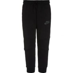 Nike Performance TECH PANT Spodnie treningowe black/anthracite. Czarne spodnie chłopięce marki Nike Performance, z bawełny. W wyprzedaży za 224,25 zł.