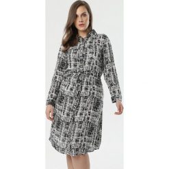 Czarna Sukienka Najma. Czarne sukienki damskie Born2be, xl, bez wzorów, z wykładanym kołnierzem, z długim rękawem, długie, midi, koszulowe. Za 79,99 zł.