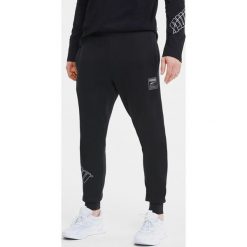 Puma Rebel Bold Spodnie dresowe Czarny. Czarne spodnie męskie Puma, s, bez wzorów, z bawełny. Za 206,95 zł.