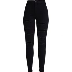 Topshop JONI Jeans Skinny Fit black. Czarne rurki damskie marki Topshop, z elastanu. Za 229,00 zł.