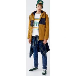 Nylonowa kurtka z polarową podszewką. Żółte kurtki męskie marki Pull&Bear, m, bez wzorów, z nylonu, bez kaptura. Za 159,00 zł.