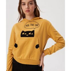 Bluza z kocim motywem - Żółty. Żółte bluzy damskie Sinsay, s, bez wzorów, bez rękawów, bez kaptura. Za 49,99 zł.