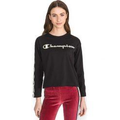 Champion Koszulka Czarny. Czarne koszulki damskie Champion, l, z nadrukiem, z bawełny, bez kołnierzyka, z długim rękawem. Za 152,95 zł.