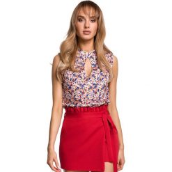 Bluzka bez rękawów w kwiatuszki - model 1. Bluzki damskie Moe, s, z nadrukiem, z elastanu, ze stójką, bez rękawów. Za 139,00 zł.