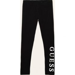 Guess Jeans - Legginsy dziecięce 118-175 cm. Czarne spodnie dziewczęce Guess Jeans, z nadrukiem, z elastanu. Za 99,90 zł.
