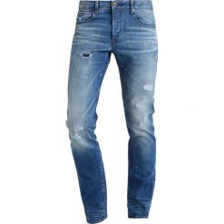 GStar 3301 SLIM Jeansy Slim fit medium indigo aged. Niebieskie jeansy męskie relaxed fit marki G-Star. W wyprzedaży za 439,20 zł.