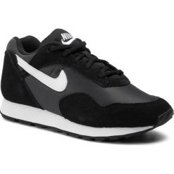 Buty NIKE - Outburst AO1069 001 Black/White/Anthracite. Czarne buty sportowe damskie Nike, bez wzorów, ze skóry, bez obcasa, na płaskiej podeszwie, bez zapięcia. W wyprzedaży za 289,00 zł.