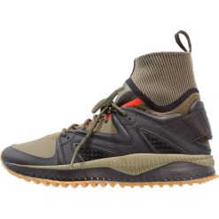 Puma TSUGI KORI Tenisówki i Trampki wysokie black/olive night. Czarne tenisówki męskie Puma, z materiału. W wyprzedaży za 408,85 zł.