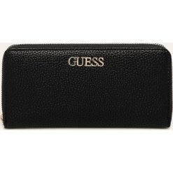 Guess Jeans - Portfel. Różowe portfele damskie Guess Jeans, z aplikacjami, z poliesteru. Za 289,90 zł.