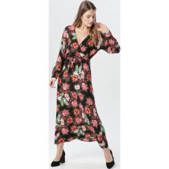 Czarna Sukienka Oriel. Czarne sukienki damskie Born2be, xl, w paski, z tkaniny, bez kołnierzyka, z długim rękawem, długie, midi, kopertowe. Za 79,99 zł.