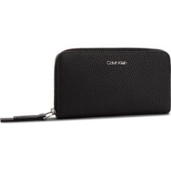 Duży Portfel Damski CALVIN KLEIN JEANS - Ck Base Large Zip Around Xl K60K604501 001. Czarne portfele damskie Calvin Klein Jeans, z jeansu. Za 299,00 zł.