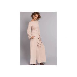 Kombinezon Classy Babe - nude. Brązowe kombinezony damskie marki Madnezz, s, w paski, z elastanu, eleganckie, bez kołnierzyka, bez rękawów. Za 399,00 zł.
