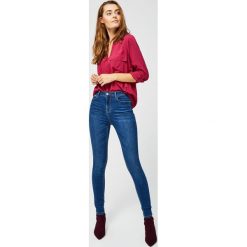 Jeansy typu extra high waist. Niebieskie jeansy damskie Moodo, s, z podwyższonym stanem. Za 59,99 zł.