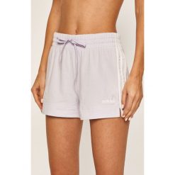 Adidas - Szorty. Fioletowe spodenki sportowe damskie Adidas, s, bez wzorów, z elastanu, sportowe. Za 119,90 zł.