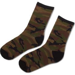 Skarpety Wysokie Damskie VANS - Ticker Sock VN0A2XBNCMA Camo. Zielone skarpetki damskie marki Vans, bez wzorów, z elastanu. Za 39,00 zł.