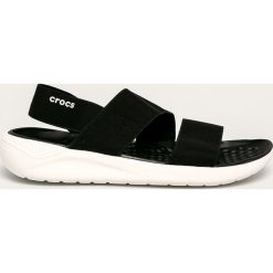 Crocs - Sandały. Różowe klapki damskie Crocs, bez wzorów, z gumy, bez obcasa, na obcasie. W wyprzedaży za 179,90 zł.
