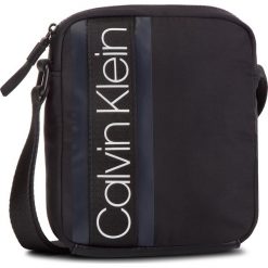 Saszetka CALVIN KLEIN - Clash Mini Reporter K50K504195 001. Czarne torby męskie skórzane Calvin Klein, bez wzorów, ze skóry ekologicznej, młodzieżowe. W wyprzedaży za 219,00 zł.