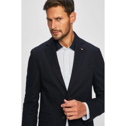 Tommy Hilfiger Tailored - Marynarka. Niebieskie garnitury męskie Tommy Hilfiger Tailored, bez wzorów, z elastanu, eleganckie. W wyprzedaży za 999,90 zł.